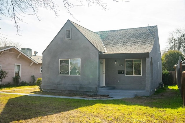 view of front of home with a front yard