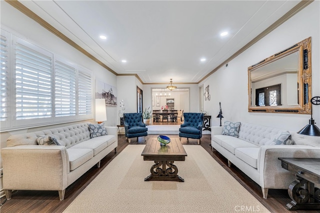 living room featuring ornamental molding and dark hardwood / wood-style floors