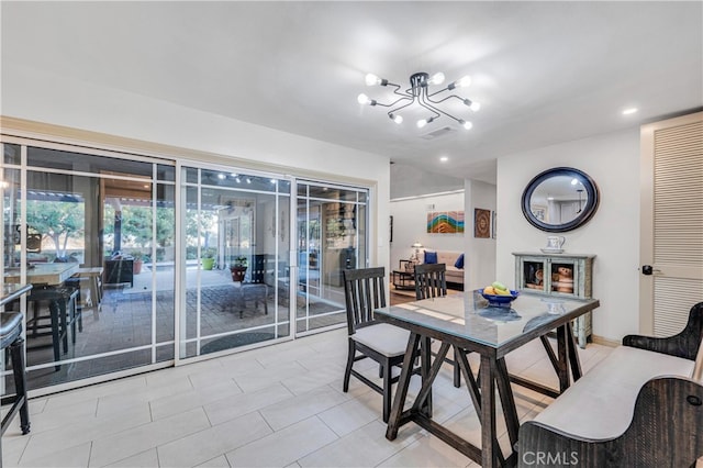 dining space featuring a chandelier