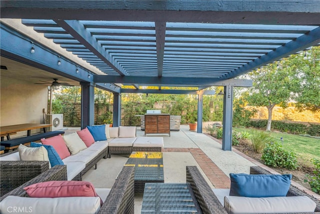 view of patio / terrace featuring an outdoor living space, an outdoor kitchen, and a pergola