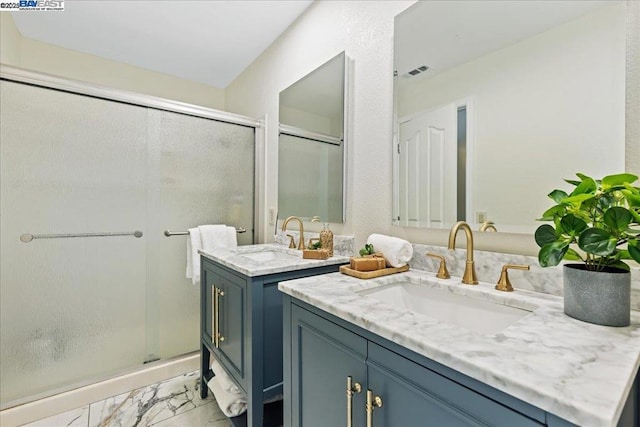 bathroom featuring vanity and walk in shower