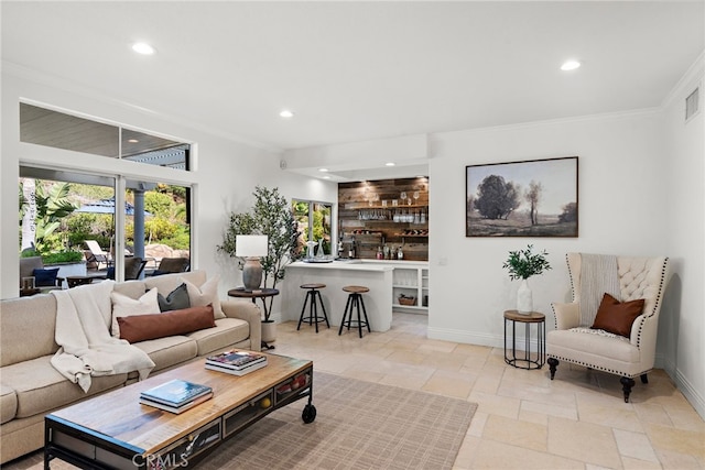 living room featuring ornamental molding