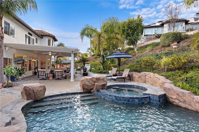 view of swimming pool with a pergola, a patio, and an in ground hot tub