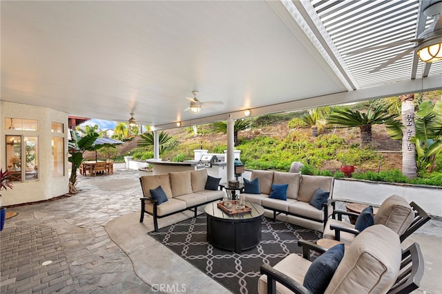 view of patio featuring ceiling fan and an outdoor hangout area