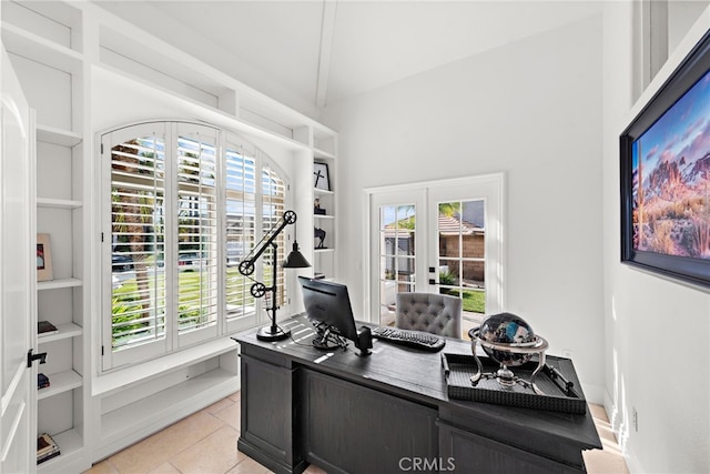 tiled office space featuring french doors