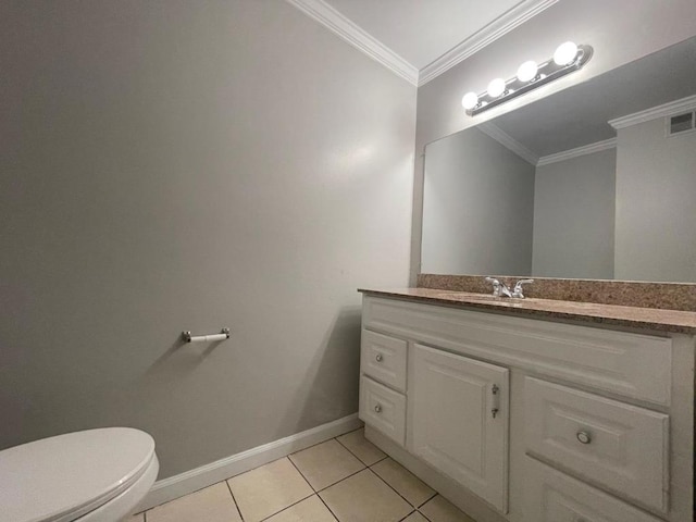 bathroom with ornamental molding, toilet, tile patterned flooring, and vanity