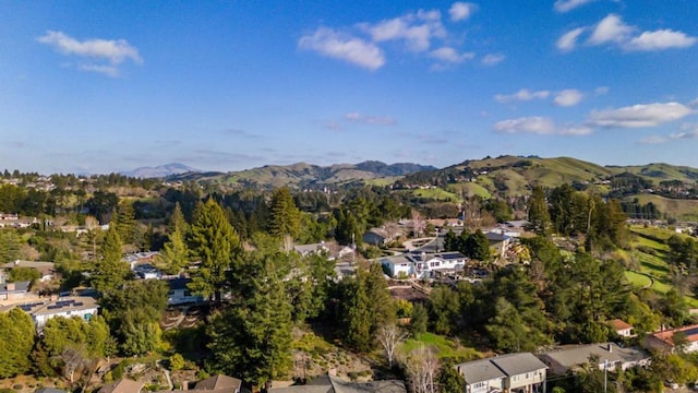 birds eye view of property with a mountain view