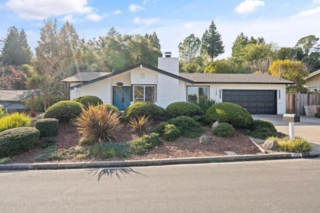 single story home with a garage