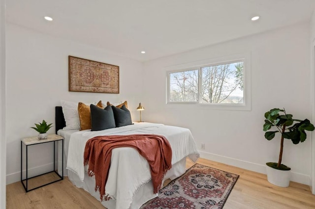 bedroom featuring light hardwood / wood-style flooring