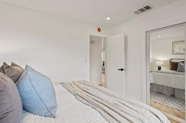 bedroom featuring hardwood / wood-style flooring