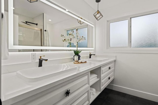 bathroom with vanity, hardwood / wood-style floors, and an enclosed shower