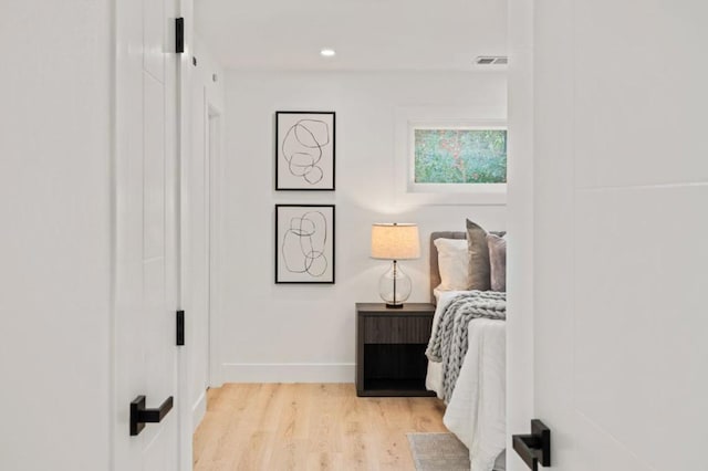 bedroom featuring light wood-type flooring