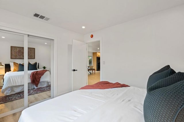 bedroom featuring light hardwood / wood-style flooring