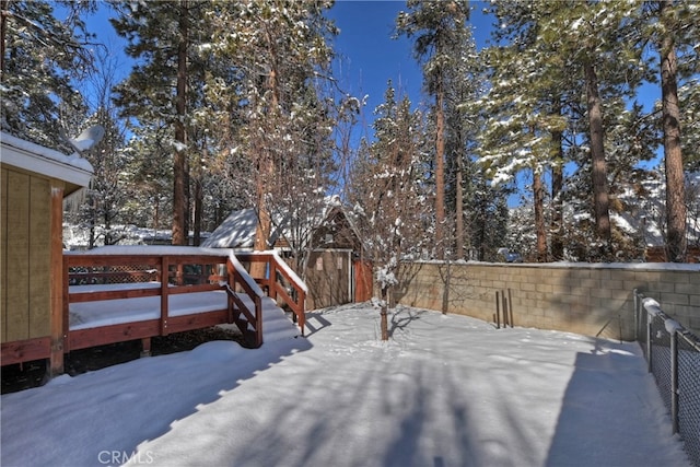 view of yard covered in snow