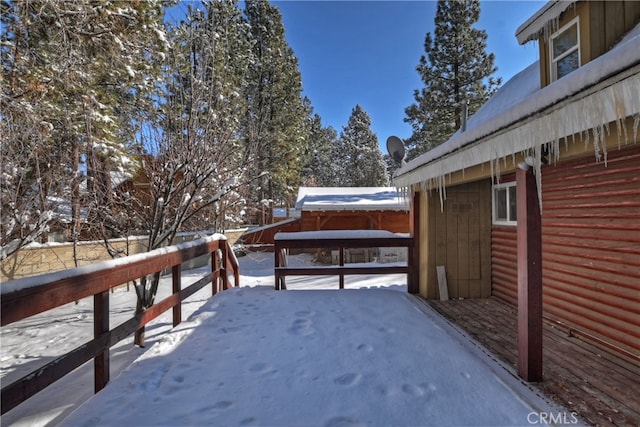 view of snow covered deck