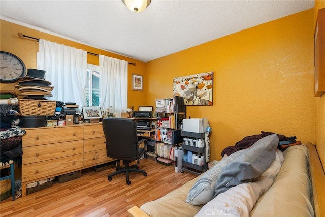 office space with light hardwood / wood-style floors