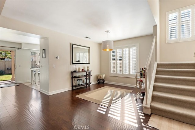 interior space with dark hardwood / wood-style flooring