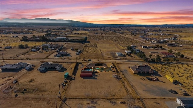 aerial view at dusk with a mountain view