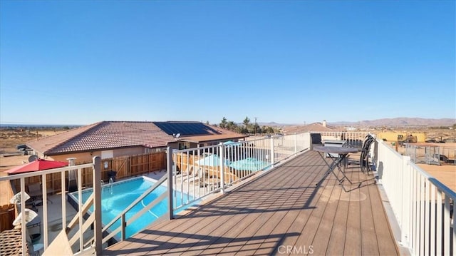 exterior space with a mountain view and a patio area