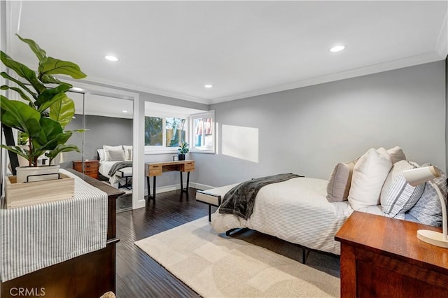 bedroom featuring dark hardwood / wood-style flooring and ornamental molding