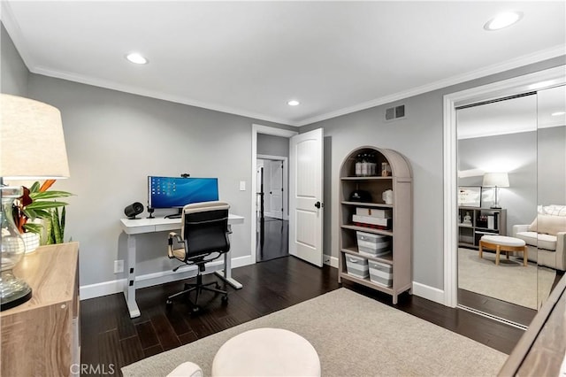 home office featuring crown molding and dark hardwood / wood-style flooring