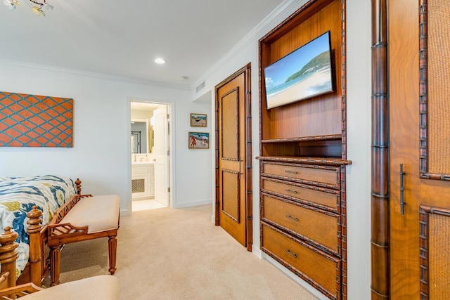 corridor featuring crown molding and light colored carpet