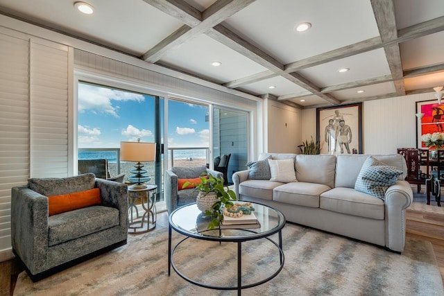 living room with beamed ceiling, coffered ceiling, and hardwood / wood-style flooring