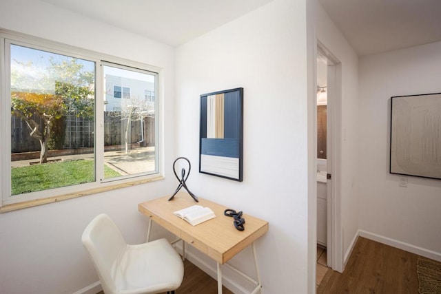 office area with hardwood / wood-style flooring