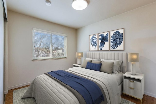 bedroom featuring hardwood / wood-style floors