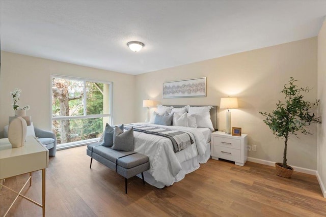 bedroom featuring hardwood / wood-style flooring