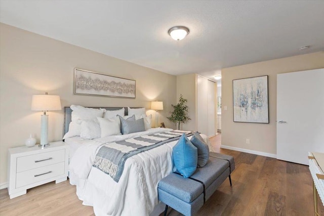 bedroom featuring light hardwood / wood-style flooring