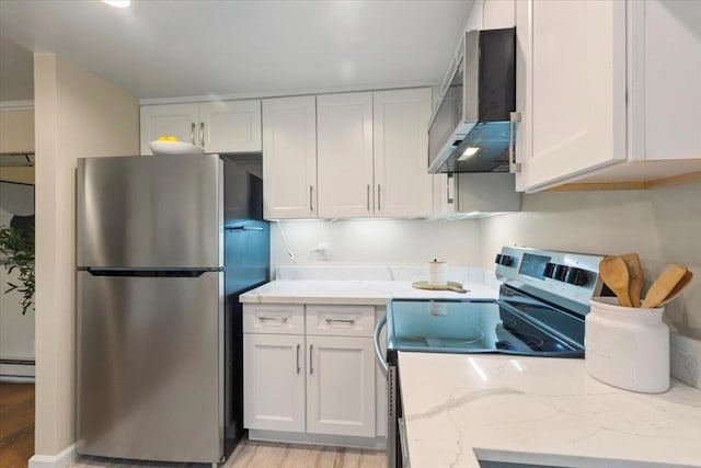 kitchen with ventilation hood, white cabinetry, light stone counters, stainless steel appliances, and light hardwood / wood-style flooring