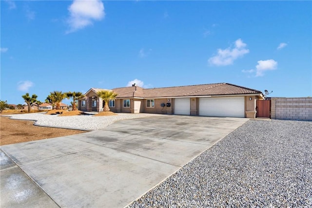 single story home with a garage