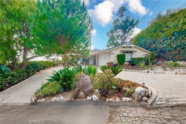 view of front of property with a garage