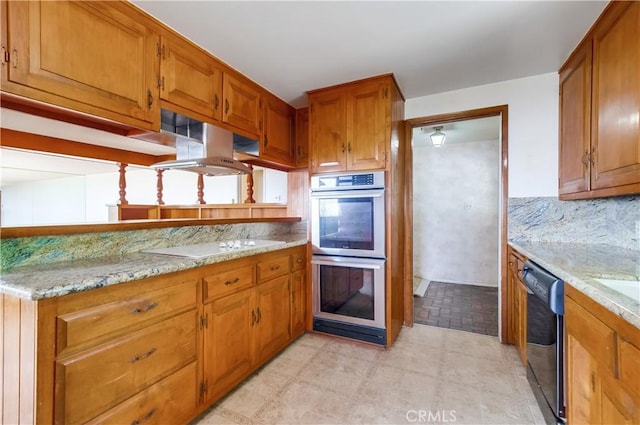 kitchen with dishwasher, light stone countertops, white electric stovetop, and double oven