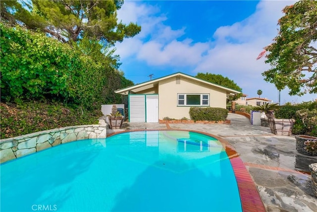 view of pool with a patio