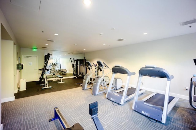 workout area featuring carpet