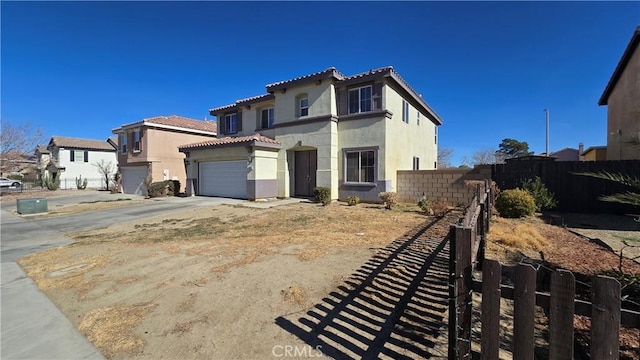 view of front of property with a garage