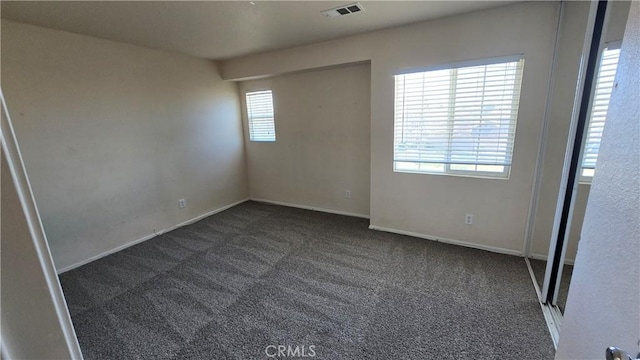 view of carpeted spare room