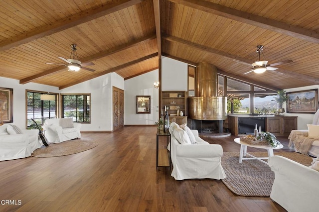 living room with beamed ceiling, ceiling fan, dark hardwood / wood-style floors, and high vaulted ceiling