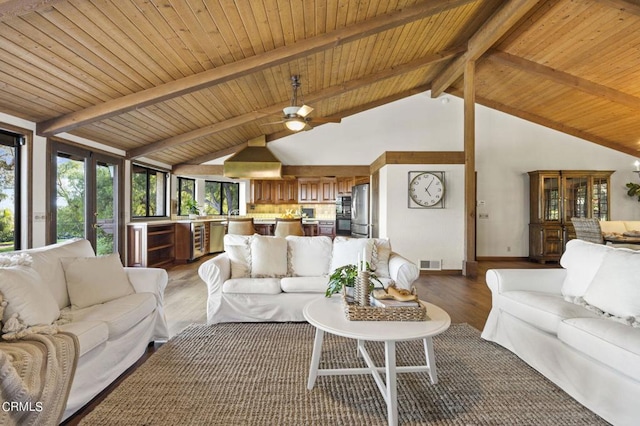 living room with wood ceiling, ceiling fan, hardwood / wood-style floors, high vaulted ceiling, and beamed ceiling