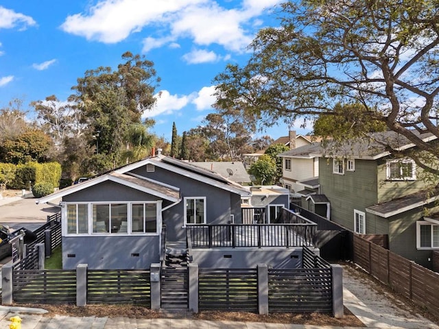 exterior space featuring a wooden deck