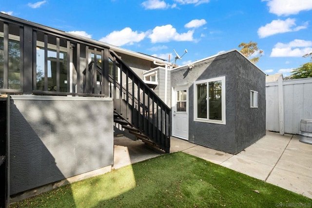 rear view of property with a patio area