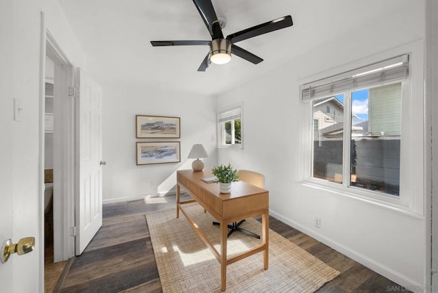 office with ceiling fan and dark hardwood / wood-style flooring