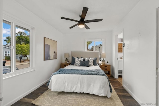 bedroom featuring dark hardwood / wood-style floors and ceiling fan