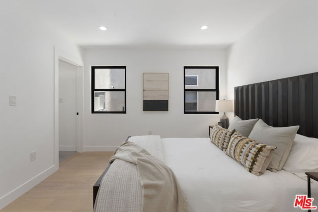 bedroom featuring light wood-type flooring