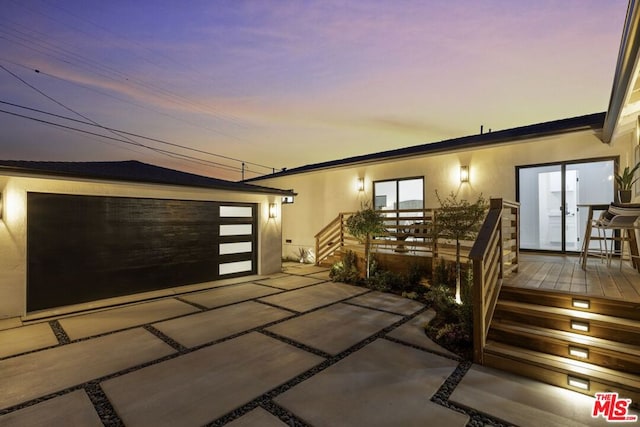 view of front of home with a garage