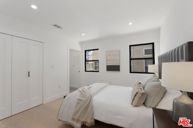 bedroom featuring light hardwood / wood-style flooring