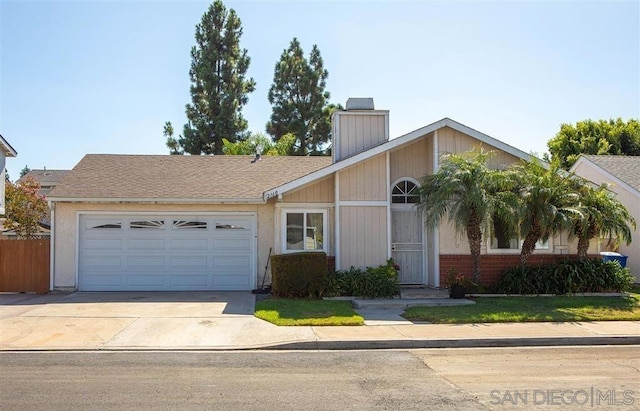 single story home with a garage