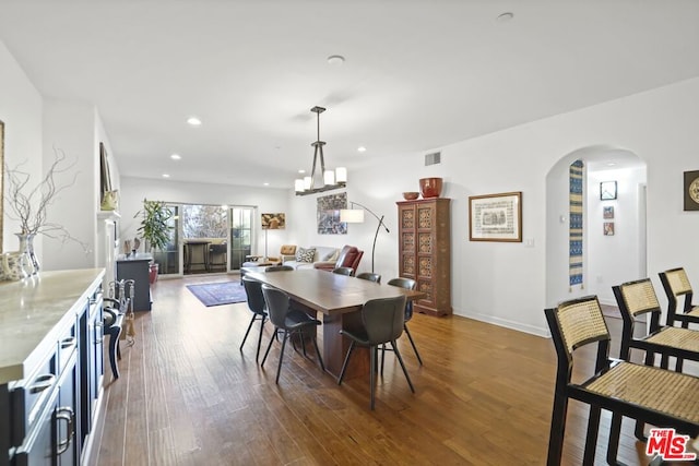 dining room featuring dark hardwood / wood-style floors